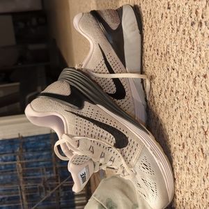 Nike women's sneakers.  USA 7.5. Running Stride.